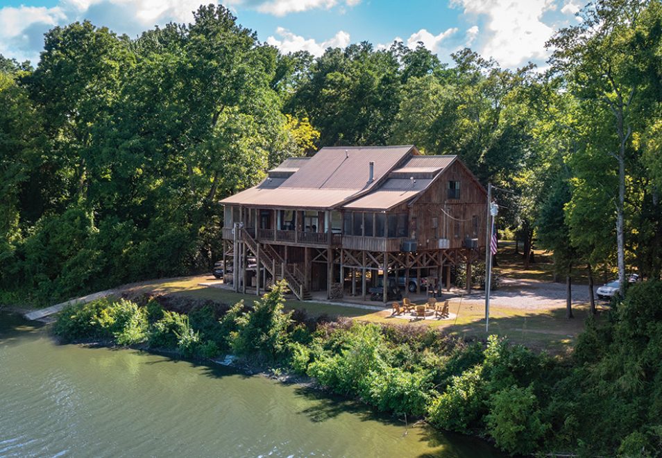 A beautiful aerial shot of the Alias’s cabin on the banks of Old River oxbow lake.